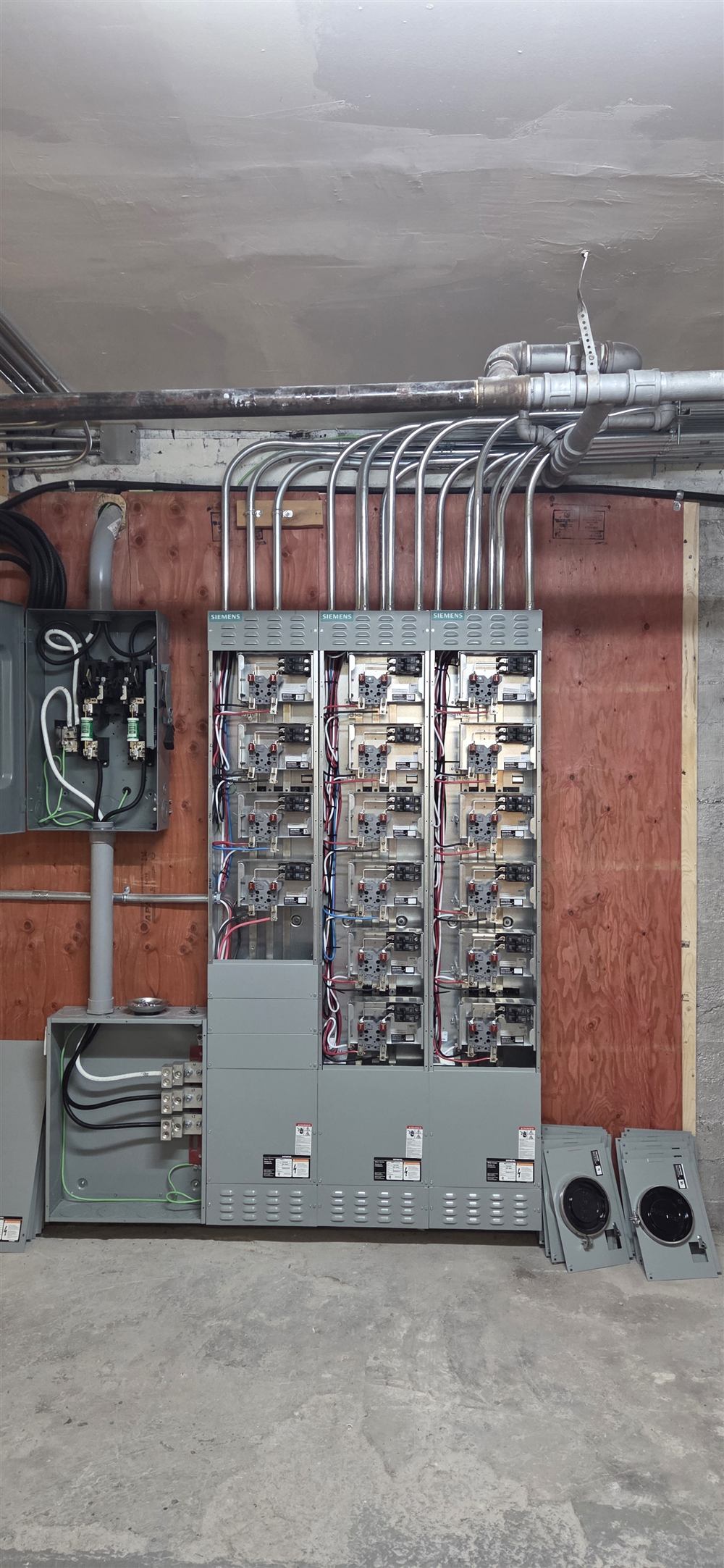 Multi-unit meter stack installed in a condo electrical room